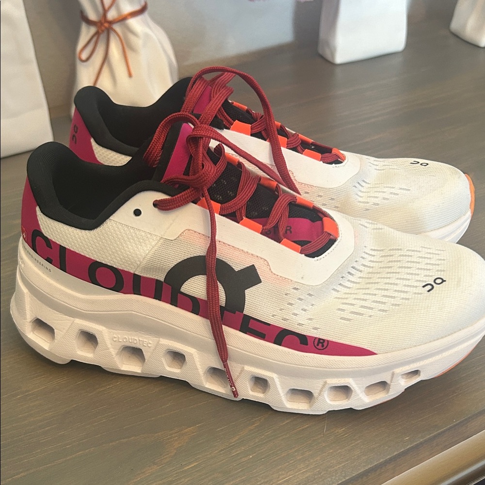 On Running White and Red Sneakers